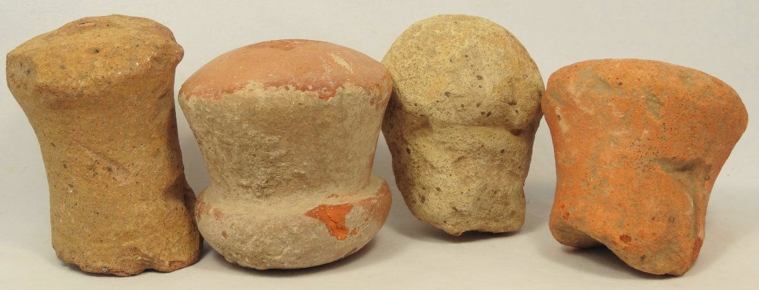 A lot of 4 Roman terracotta amphora stoppers: A lot of 4 Roman terracotta amphora stoppers, each with earthen deposits. Largest measures 3" (7.6 cm) in length. 3 are Ex English Private Collection, the one with nicely formed rim Ex New York Privat