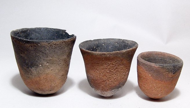 Egyptian Neolithic ceramic vessels, Ex Lord Kitchener: A Lot of 3 Egyptian Neolithic ceramic vessels, c. 5000 - 4000 BC, each with hemispherical bases, two with flaring mouths and the third with near vertical walls. Each with evidence of vertical burnishi