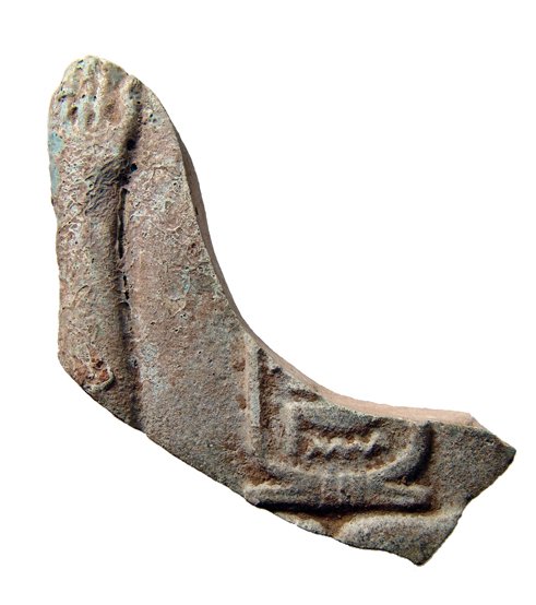 Egyptian fragment of a 'Ka' sign, Ex Lord Kitchener: An Egyptian blue faience fragment of a 'Ka' sign, Late Period, c. 664 - 30 BC, with the lower portion of a cartouche in relief on either side. Fragmentary but nicely detailed and well-preserved with r