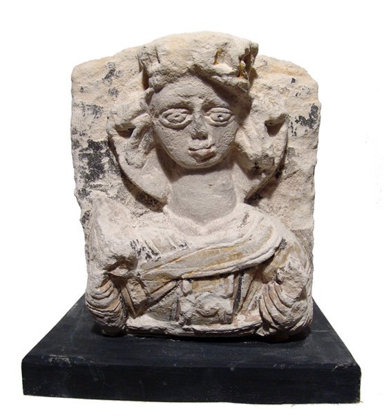 European limestone relief with figure of Monarch: A European limestone relief with half-length figure of a Monarch, Renaissance, 15th - 16th Century, a square architectural element with square recessed hole on left side. The Monarch is frontally faci