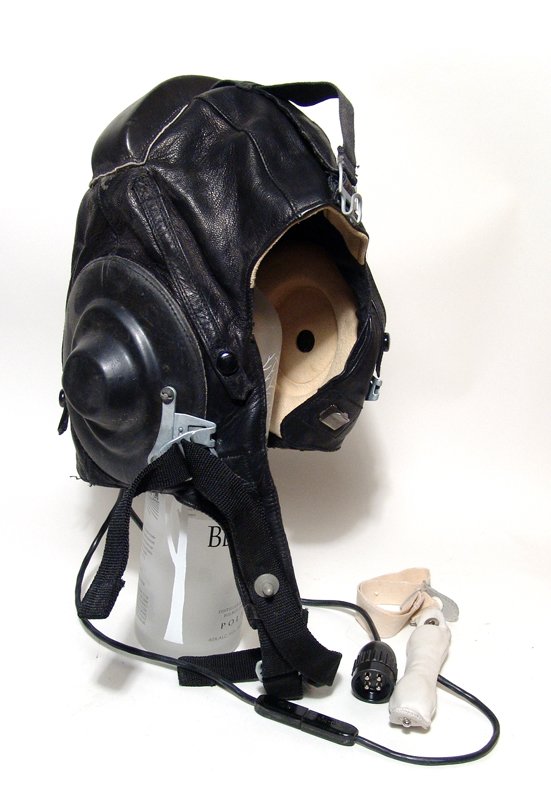 Soviet air force helmet worn by VVS MIG Aircraft pilots: A Soviet air force pilot helmet worn by VVS MIG Aircraft pilots, this example during the 1980’s. Made from soft genuine leather and possesses the original built-in headphones, electronic attachment 