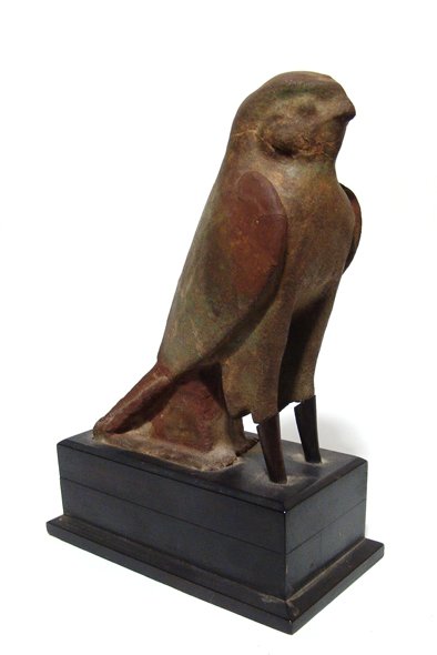 A fantastic Egyptian glazed composition figure of Horus: A fantastic Egyptian glazed composition figure of Horus, Late Period, c. 664 - 30 BC, the god in his characteristic form of a falcon, his face and body nicely detailed. Some black detailing on the hea