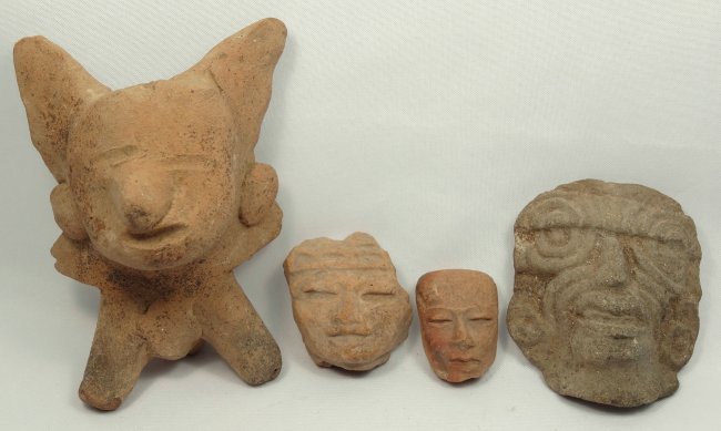 Group of 4 Pre-Colombian terracottas: A group of 4 Pre-Colombian terracottas, including a Colima figure with spiked ears, two heads from figures, and a terracotta votive head. Largest piece measures 3 7/8 in (9.8 cm) in height. Ex Souther