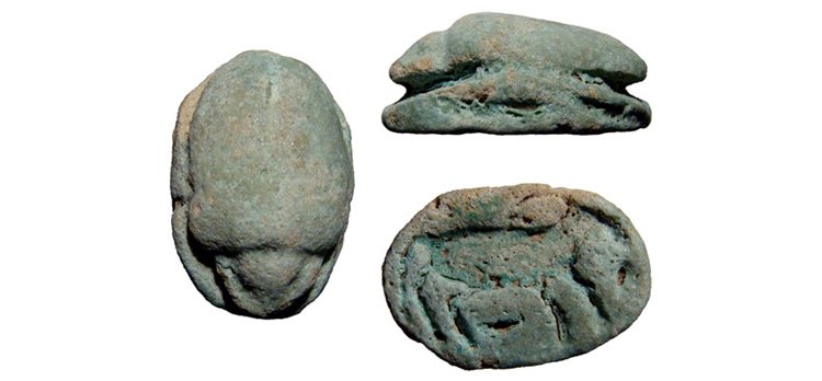 Egyptian 3rd Intermediate scarab with galloping calf: An Egyptian 3rd Intermediate faience scarab with galloping calf, c. 1075 – 656 BC. Some light blue color of the glaze remain. Intact. 32 x 22mm. Ex Royal Athena Galleries, New York.