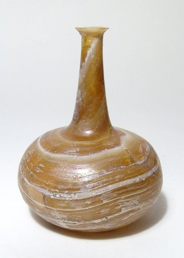A pleasing Roman marbled glass unguentarium: A pleasing Roman marbled glass unguentarium, 1st Century AD, the squat body and tall cylindrical neck with swirling opaque white 'marble' bands, H: 3 7/8 in (9.9 cm). Some minor repair and age cracks.