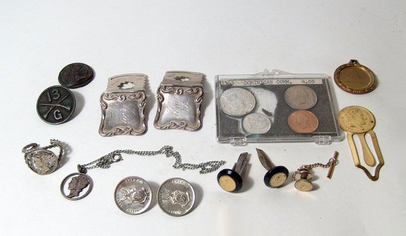 A lot of antique coins and ephemera: A lot of antique coins and ephemera. Lot includes inscribed silver bucklers (2) with the date 1895, some Civil War era buttons, Liberty dime ring and pendant, a set of Dominican coins, a pair of cuff