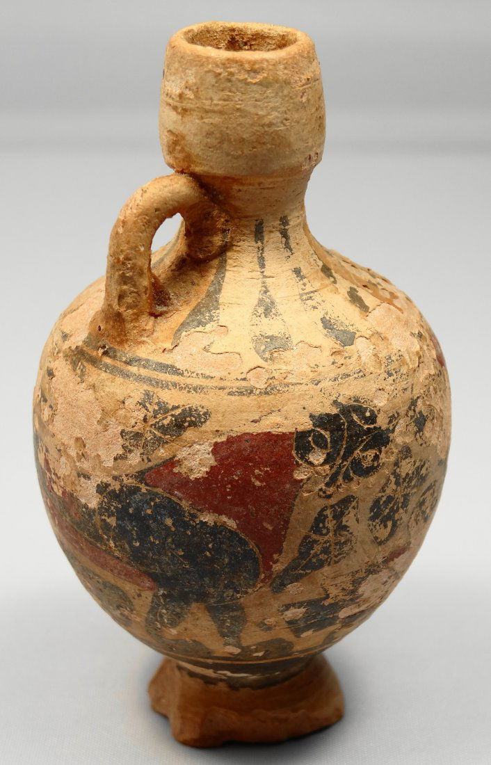A Proto-Corinthian miniature amphora: A Proto-Corinthian miniature amphora, c. 725-600 BC, depicting a band of animals, likely two panthers, and some floral decoration, though much of the decoration has been worn off, obscuring the scene.