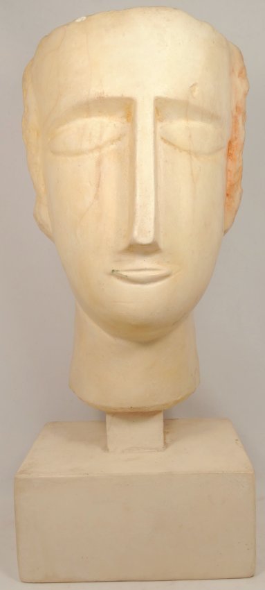 Museum replica of a South Arabian Head: A composite museum replica of a South Arabian Head, H: 11 1/5 in (28.4cm). The base is part of the piece, not separate from the head. Collection number on bottom and a screw marked 'University Museum.