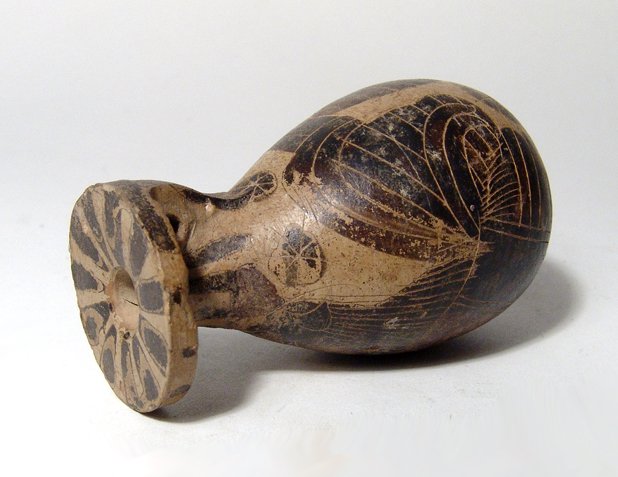 Etruscan Proto-Corinthian imitation aryballos: An Etruscan Proto-Corinthian imitation aryballos, 6th Century BC, the piriform body depicting a rooster and chicken in black-figure, accentuated by incised lines, rosettes in the field, tongues and pe