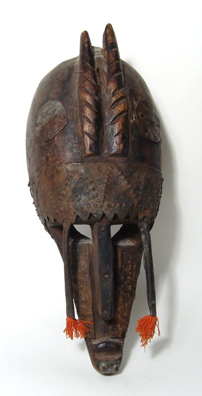 Marka wood mask from Mali: An anthropomorphic Marka wood mask from Mali, similar to the Bambara (Bamana) masks in style, they usually come in pairs (male & female). This piece possesses horns (antelope?), a long aquiline nose w