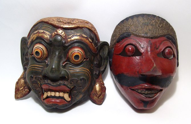 A lot of two wooden masks: A lot of two wooden masks. The first is an Indonesian Topeng mask of a prince, early-mid 20th Century, unattributed as to island and of polychromed wood. L: 8 ¾ in (22 cm). The second is an unattribu