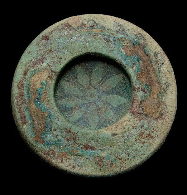 Faience dish in the form of an open lotus: A molded faience dish in the form of an open lotus, Graeco-Roman, c. 2nd Century BC/AD. The bottom half of the dish shows the leaves and petals, molded in high relief, the top with wide, flat rim and