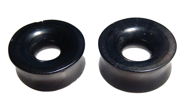 A pair of Obsidian ear spools, Mexico: A pair of Obsidian ear spools, Mexico, c. 300 BC - AD 500, nicely carved and well-polished, both about 3.2 cm in diameter. One with minor edge chipping. Ex Neal Auctions.