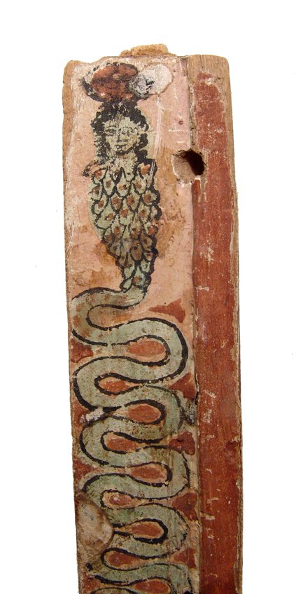 Egyptian wood leg from a funerary bier, Graeco-Roman: A beautifully painted Egyptian wood leg from a funerary bier, Graeco-Roman, c. 3rd Century BC - 2nd Century AD, fashioned from a single piece of wood, with two straight sides and a single curved edge,