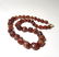 Exceptional strand of 37 striped carnelian beads