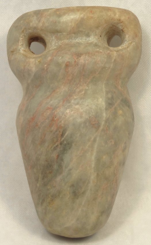 An Egyptian blue marble cosmetic vessel: An Egyptian blue marble cosmetic vessel, c. 3rd Intermediate to Late Period, 1075-343 BC, with white and brown veining. Two handles are carved out, and the body tapers to a rounded base, H: 2 ¼ in (5