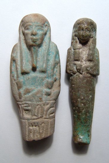 A lot of 2 Egyptian faience ushabtis: A lot of 2 Egyptian faience ushabtis, the first from the 3rd Intermediate Period, c. 1075 - 664 BC, with traces of black on the headband and green color, H: 3 1/3 in (8.5cm), the second a blue-green u