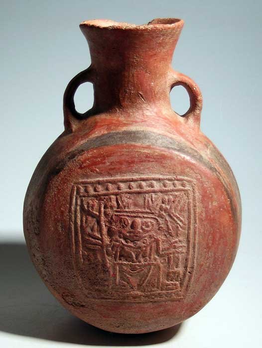An excellent Huari vessel from Peru: An excellent Huari vessel from Peru, ca. 650 - 800 AD. This fine canteen form is 8-1/4 in (21cm) high and features two depictions of a shaman holding corn stalks on one side and planting sticks on the