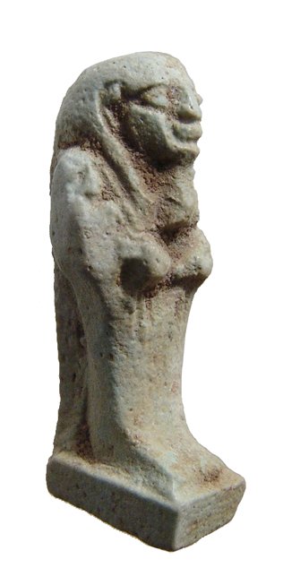 Egyptian pale green faience amulet of an Ushabti: An Egyptian pale green faience amulet of an Ushabti, Late Period, c. 664 - 30 BC, mummiform on square integral base, wearing tripartite wig with false beard, arms folded across check, hieroglyphic ins