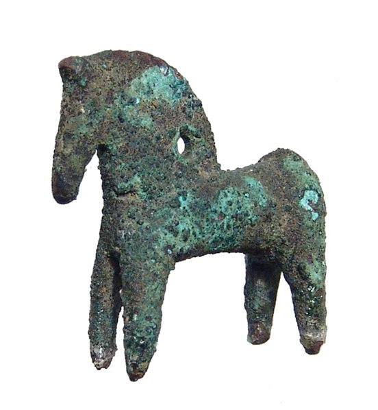 A small Greek bronze figure of a horse: A small Greek bronze figure of a horse, c. 6th - 5th Century BC, of attractive style and with a nice green - brown patina. H: 1 1/3 in (3.3cm), W: 1 2/5 in (3.6cm). Ex Tepper Galleries; Ex Brooklyn He