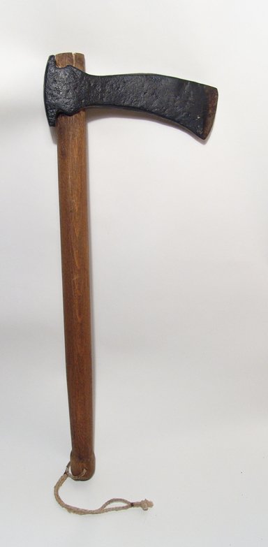 European iron axe-head mounted on a wood shaft: A European iron axe-head mounted on a wood shaft, 14th 16th Century, the metal is stable and sealed and in great condition, the wood shaft giving the weapon the overall feel of how the axe originally 