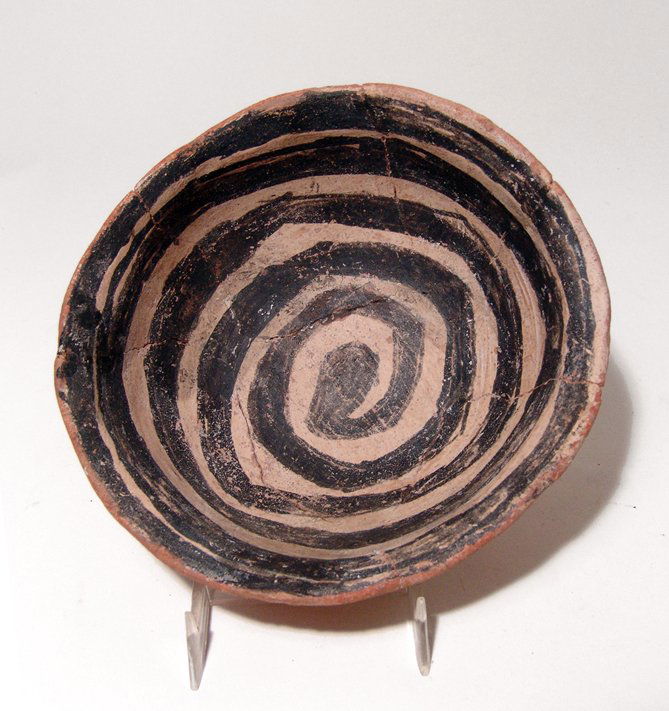 Anasazi Salado Polychrome transitional Gila Pinto bowl: An Anasazi Salado Polychrome transitional Gila Pinto bowl, American Southwest, c. AD 1300 - 1400, the interior decorated with black over white concentric bands, the exterior reserved red. 5 3/4 in x 2