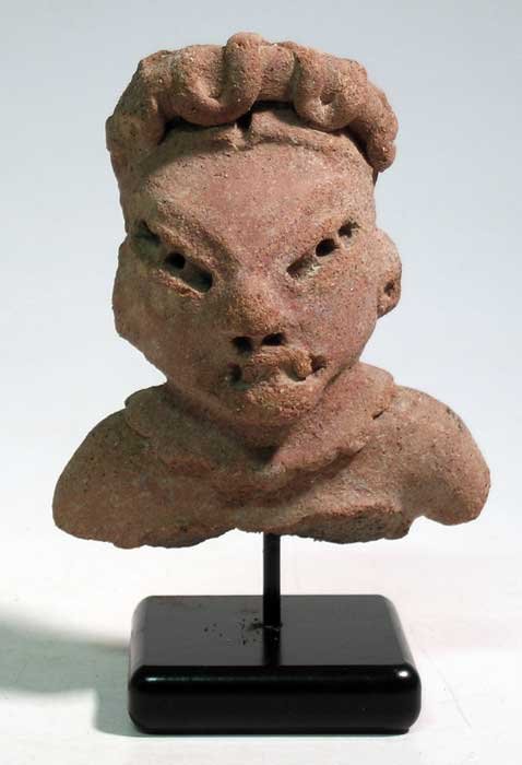 Pre-Classic figure found near Mitla in Oaxaca: An exceptional Pre-Classic figure found near Mitla in Oaxaca, Mexico, c. 400 - 100 BC, a well-preserved example depicting an elite individual with prominent teeth, filed to represent fangs. He is ador