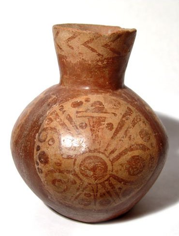 A fine Moche V globular jar from Peru: A fine Moche V globular jar from Peru, c. AD 550 - 700, decorated with three complex depictions of weapons bundles, showing a shield, battle club, atlatl and spears, surrounded by various decorative d