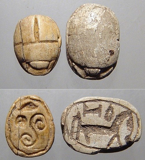 A lot of 2 Egyptian steatite scarabs: A lot of 2 Egyptian steatite scarabs. The first is from the Late Period, c. 664 - 332 BC, with a horse and a few signs on the base. 13x10mm. Small chip, no remaining glaze. Cf. Matouk II 425. The seco