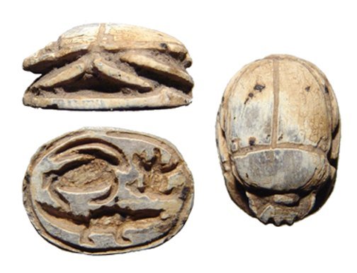 An Egyptian 2nd Intermediate steatite scarab: An Egyptian 2nd Intermediate steatite scarab. Crocodile engraved on base among other symbols, L: 1 cm, W: 1.1 cm. Collection of an Cheltenham, England Doctor From the 1950's.