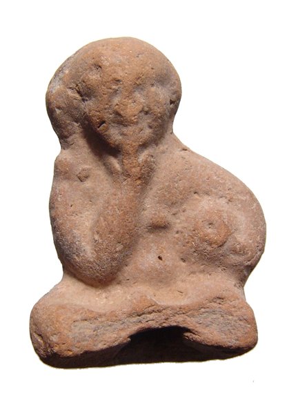 Egyptian terracotta seated figure of Harpokrates: Egyptian terracotta seated figure of Harpokrates, Ptolemaic Period, c. 2nd-1st Century BC, in characteristic pose with right finger to mouth. H: 1 7/8 in (4.7cm). Ex Dr. Gilles collection, Germany, ac