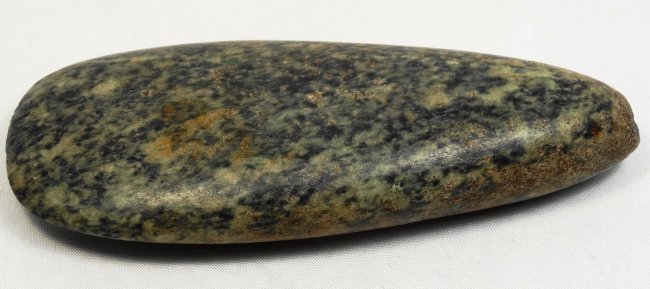 Pre-Colombian mottled green and white axe head: An early Pre-Colombian mottled green and white axe head (celt), c. 1000 BC, L: 4 in (10.1cm). A very attractive piece in perfect condition. Ex New York City private collection, purchase from Alex Acev