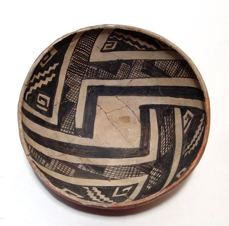 Anasazi Salado Polychrome transitional Gila Pinto bowl: A nice Anasazi Salado Polychrome transitional Gila Pinto bowl, American Southwest, c. AD 1300 - 1400, the interior with attractive geometric decoration in dark brown slip against a white ground, the e