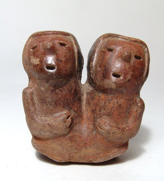 Narino effigy vessel in the form of a conjoined couple: A nice Narino effigy vessel in the form of a conjoined couple, Colombia, ca. AD 850 - 1500. Each with one leg and arm depicted, their features rendered with impressed oval eyes and mouth as well as a 