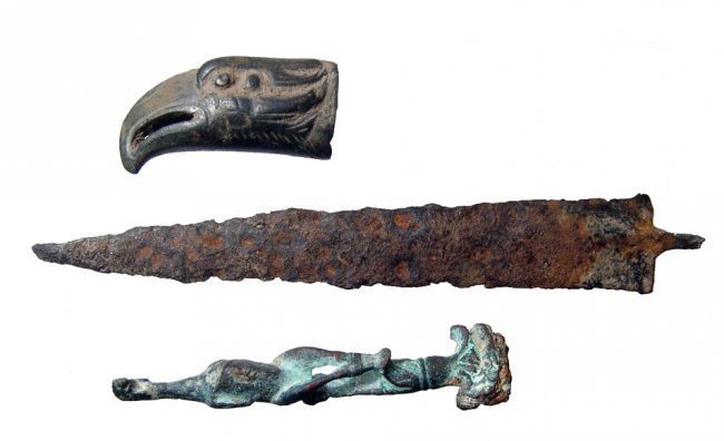 Roman bronze knife handles and an iron blade (1 of 3)