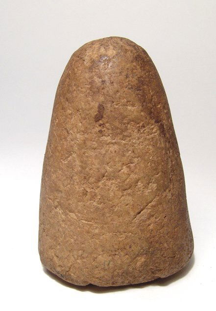 An Egyptian stone pestle, or grinding stone (1 of 4)