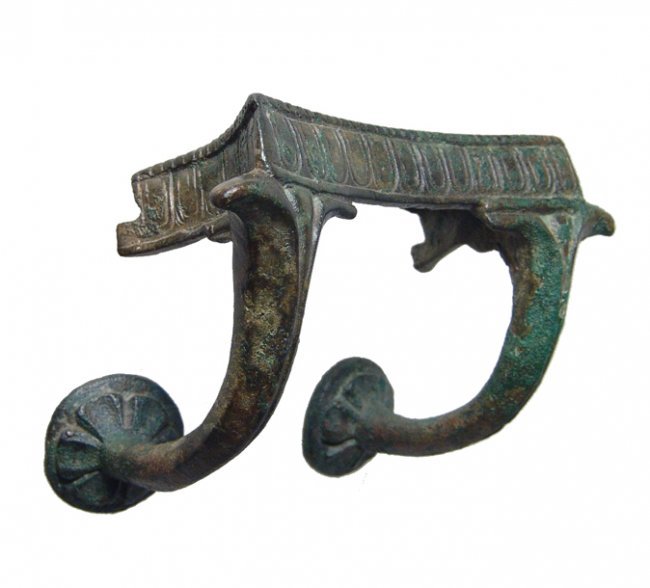 An ornate Greek bronze handle from a large vessel (1 of 5)