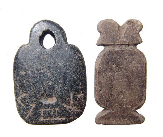 Pair of stone amulets, one an Egyptian cartouche (1 of 2)