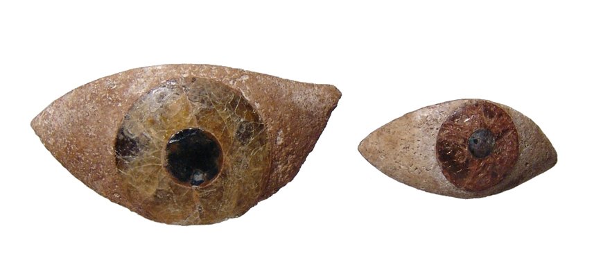 A pair Egyptian stone eye inlays (1 of 4)