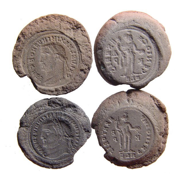 A lot of 4 terracotta coin forger’s molds (1 of 4)