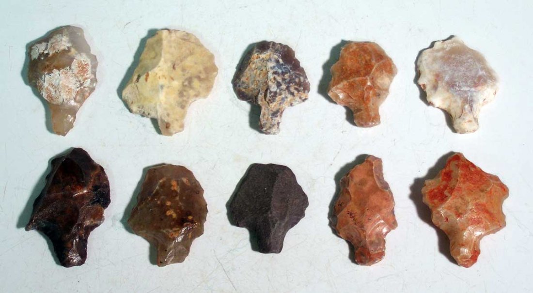 10 Aterian points from northern Sahara region of Egypt: A group of 10 Aterian points from the northern Sahara region of Egypt, ca. 45,000 – 30,000 BC. These Middle Palaeolithic period examples are made from beautifully colored chalcedony, quartz and flin