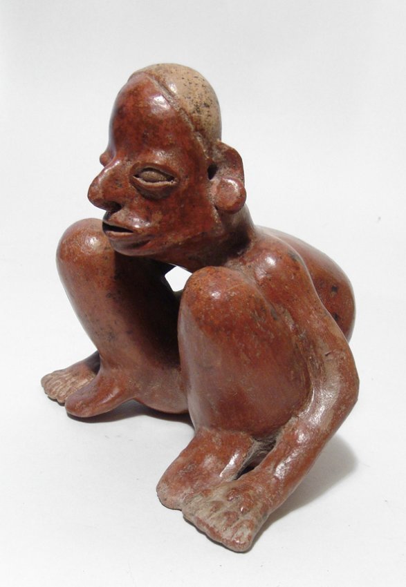 A choice Jalisco figure of a hunch back: A choice Jalisco figure of a hunch back, West Mexico, c. 100 BC - AD 250, nude, wearing ear spools, his features handsomely modelled with beautiful red-orange burnished surfaces. H: 6 3/4 in (17.2 cm)