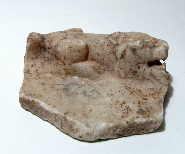 Roman marble fragment with a lion in raised relief (1 of 4)