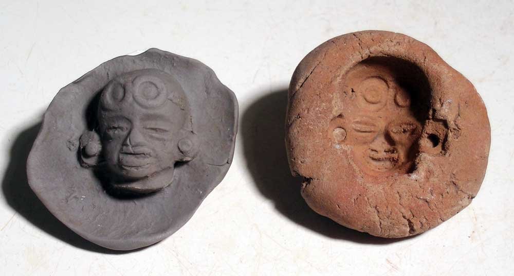 A rare Teotihuacan mold from Mexico: A rare Teotihuacan mold from Mexico, ca. AD 400 - 650. The mold is 1-3/4 in in diameter and creates a beautifully detailed Xolalpan head with ear ornaments and head décor. Cf. Berrin 'Teotihuacan'. R