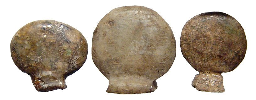 3 Egyptian stone amulets of the solar disc (1 of 2)