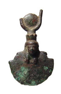 Egyptian bronze aegis depicting head of Isis: An Egyptian bronze aegis depicting head of Isis, Late Period, c. 664 - 332 BC, wearing a headdress consisting of a solar disk and horns, counterpoise at back. H: 2 2/5 in (6.1cm). Some corrosion and l