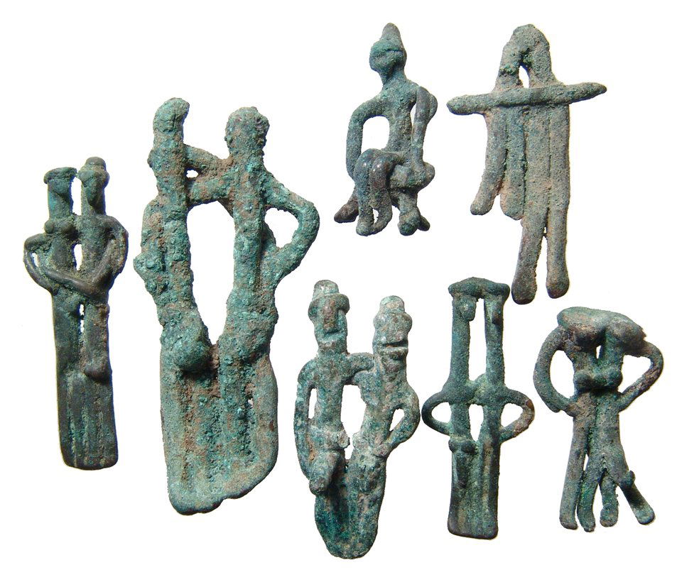 A lot of 7 bronze double humanoid figures (1 of 2)