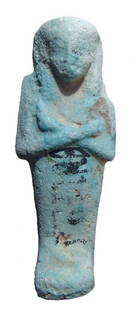 Egyptian pale blue bicolor faience ushabti: An Egyptian pale blue bicolor faience ushabti, 3rd Intermediate Period, 21st Dynasty, c. 1080 - 945 BC, mummiform, wearing tripartite wig and seshed headband, arms folded across chest, hands holding