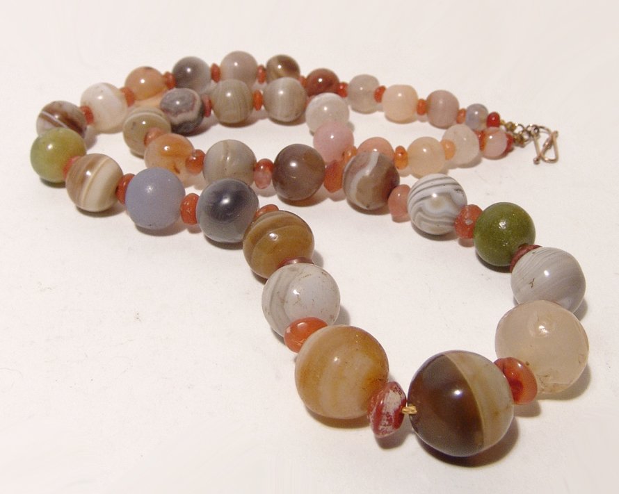 A necklace comprised of Egyptian quartz beads (1 of 3)