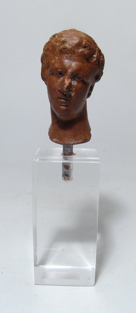 Greek terracotta head of a male youth (1 of 4)